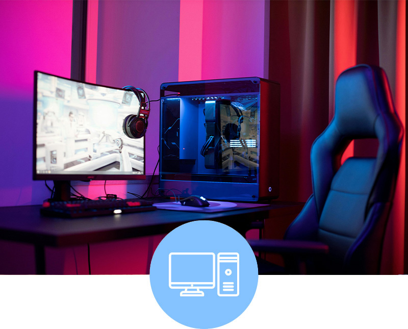 A custom gaming pc on a desk with rgb lighting