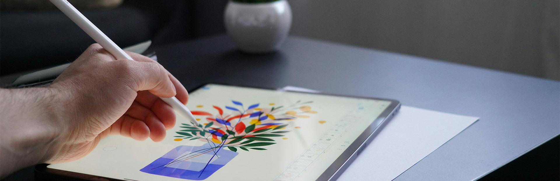 A man creating custom illustrations on a tablet