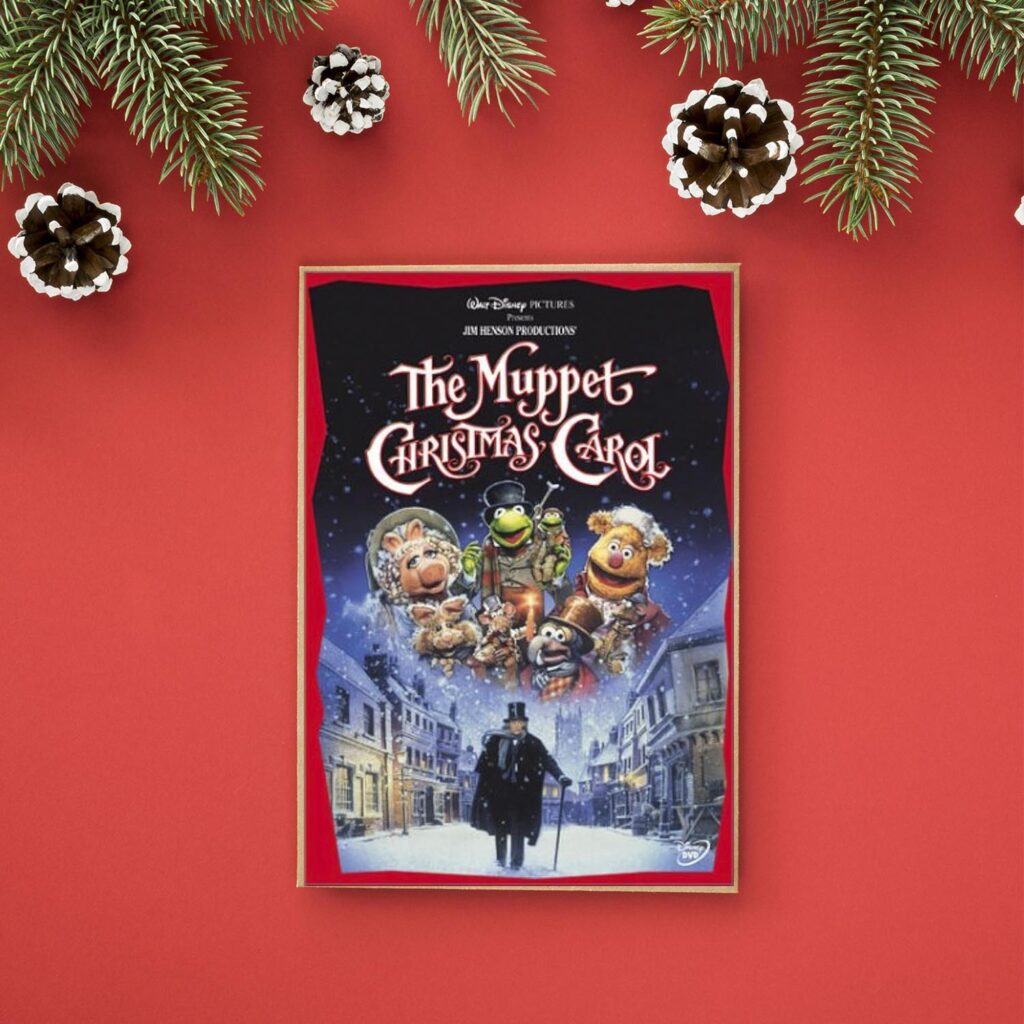 the muppet christmas carol christmas film cover on a festive background